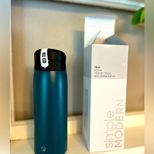 Kona 16 Oz. Travel mug with locking flip lid.